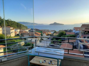 Precioso ático con terraza y vistas al mar en Poio